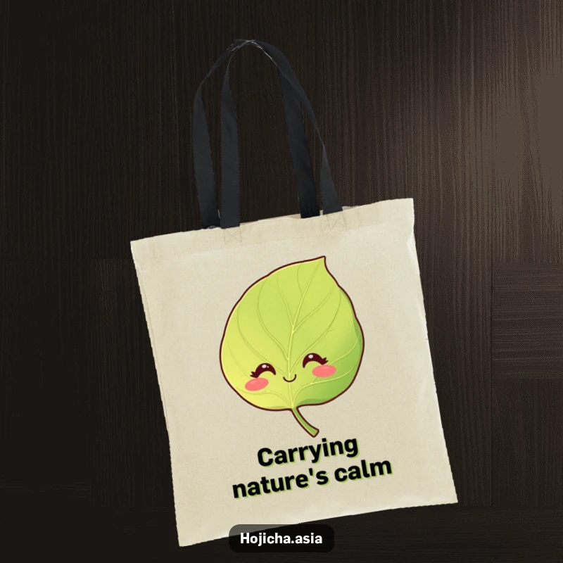 Funny tote bag with a smiling hojicha leaf, displaying gentle eyes and a calm, curious expression.